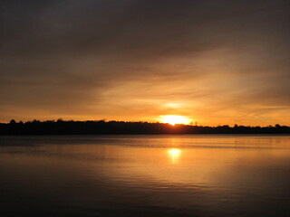 Fototapeta na wymiar Beautiful sunrise over the lake