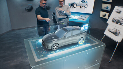 Two development engineers. Testing the speed performance of a cutting edge eco-friendly electric car with sustainable standards using an advanced, holographic augmented reality desk.