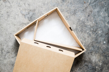 Open drawer empty kraft paper box made of paperboard. Mockup for home delivery food