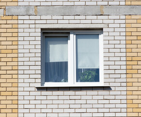Fototapeta na wymiar Window in a brick building