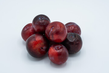 Plums isolated on white background