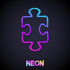 Glowing neon line Puzzle pieces toy icon isolated on black background. Vector