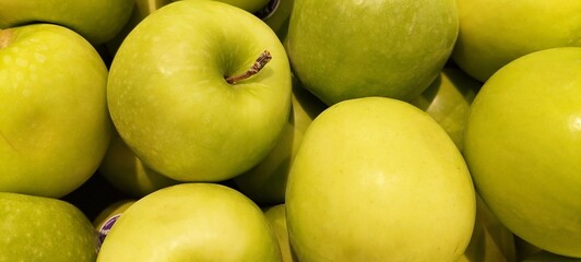 green apples in a market