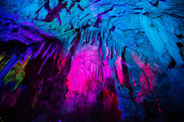 Saint Michael's Cave with colorful lights. Natural Rock Formation. Gibraltar, UK. Nature Background