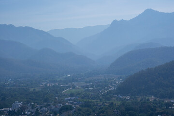 Beautiful high mountain multi layer with green tree. high forest fresh air and fog in morning...
