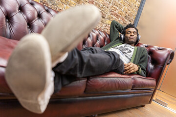 The Media Agency: Power Nap. A creative professional taking a break and a relaxed approach to his work. From a series of related images.