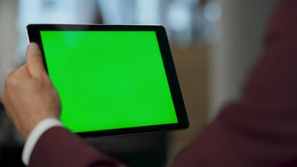 Closeup man hands swiping green tablet screen office. Ceo browsing mockup device