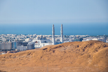 Landscape of muscat oman with desert and city of middle east asia - obrazy, fototapety, plakaty