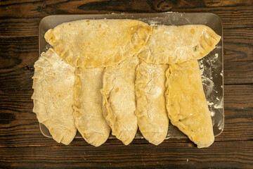 Homemade meat pies, cooked for roasting. Close-up, selective focus