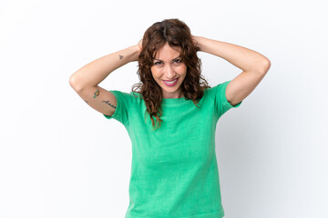 Young woman with curly hair isolated on white background laughing