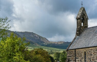 Priory and Parish Church of Saint Mary is in Beddgelert, in the Snowdonia area of Gwynedd, Wales