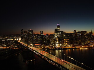 Fototapeta na wymiar Bay Bridge in San Francisco at Night Aerial
