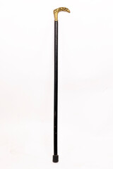 photography of used walking sticks on white background