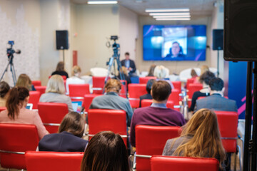 Online conference in narrow room