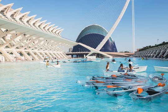 VALENCIA, SPAIN - October 15, 2022: Modern transparent boats on the water. The city of the Arts and Sciences in Valencia, Spain.
