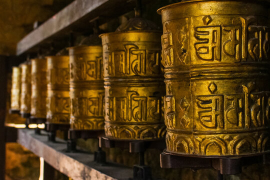 Buddhist tibetan prayer wheels in solukhumbu, nepal seen during everest base camp trek