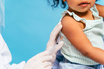 Peple gettig vaccine for covid-19 virus, vaccination against coronavirus - Father and litthe baby...