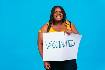 Peple gettig vaccine for covid-19 virus, vaccination against coronavirus - Black woman getting...