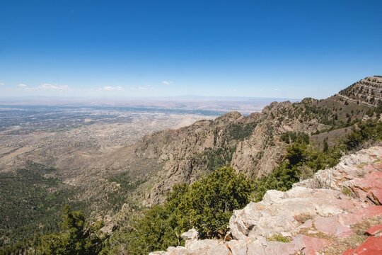 Scenic view of Sandia Peak in Albuquerque, New Mexico, in blue sky background