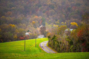 Rockfish valley with Blue Ridge mountains in autumn, scenic fall with colorful maple trees foliage by Nellysford rural countryside town, Nelson county