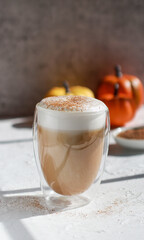 pumpkin cinnamon spice latte on white table