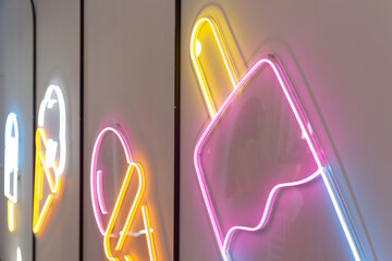 Neon image of ice cream on the wall.