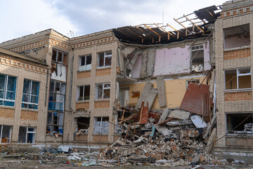 War in Ukraine. Russian invasion of Ukraine. School damaged by shelling. Destruction of infrastructure. Terror of the civilian population. War crimes