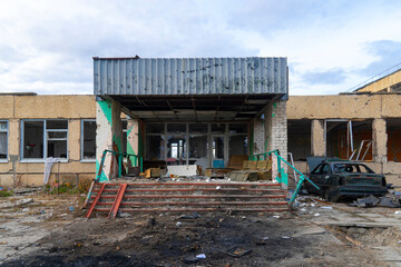 War in Ukraine. 2022 Russian invasion of Ukraine. Entrance to a school destroyed by shelling....
