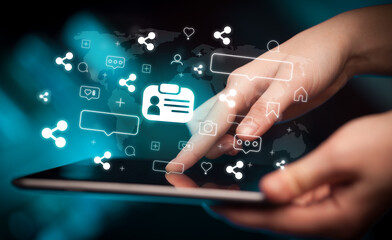 Close-up of a hand using tablet, social media concept