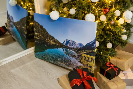 photo canvas near the christmas tree as a gift