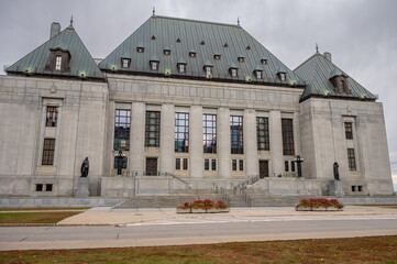 Facade of the Supreme Court of Canada building in autumn.