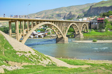 Fototapeta premium bridge over the river in the mountains