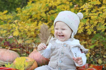 little girl in autumn park