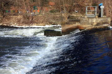 Weir on the River Weiße Elster in Döllnitz, Germany
