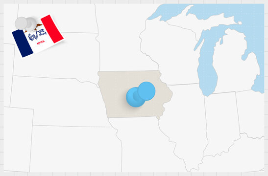 Map of Iowa with a pinned blue pin. Pinned flag of Iowa.