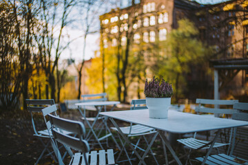 Close up of a white table at outdoor restaurant