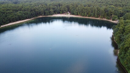 drone shot of Walden pond during the summer