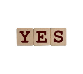 the word Yes formed with wooden dowels