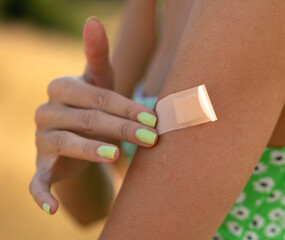 hand with bandage on a finger
