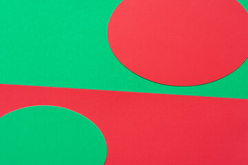 red and green christmas background with ovoid forms