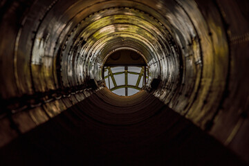 looking through the tunnel in a B-29 bomber in flight