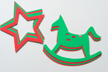christmas stars and hobby horse glyphs on blank paper