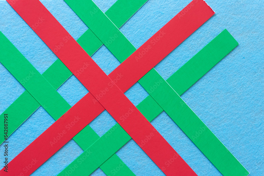 Poster blue felt and red and green paper stripes