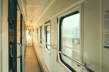 Train wagon inside. Passenger train interior. Comfortable sleeping train compartments