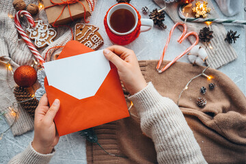 Fototapeta premium Girl Writing Letter to Santa at Christmas