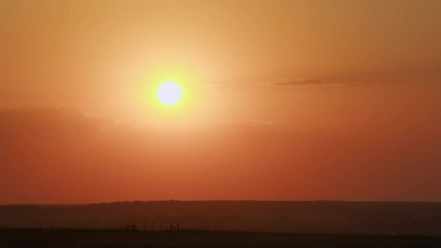 End of day, sun goes below horizon. Nature beautiful light sunrise sky colorful clouds scenery sky. Timelapse.