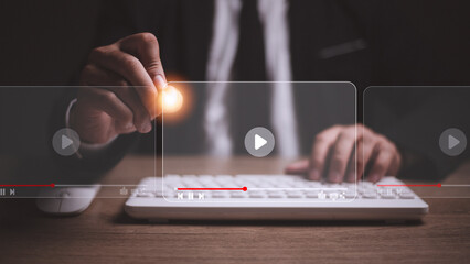 man using mouse and keyboard for streaming online, watching video on internet, live concert, show...