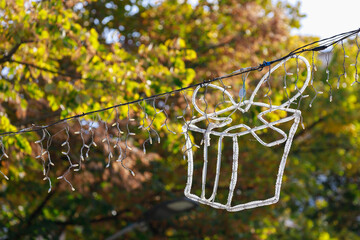 Garland in the form of a gift, selective focus. Background of preparation for Christmas and New Year holidays