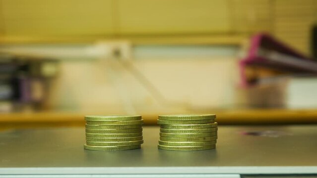 Stop motion footage coin decrease and increase business concept.