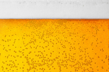 beer background texture with bubbles and foam